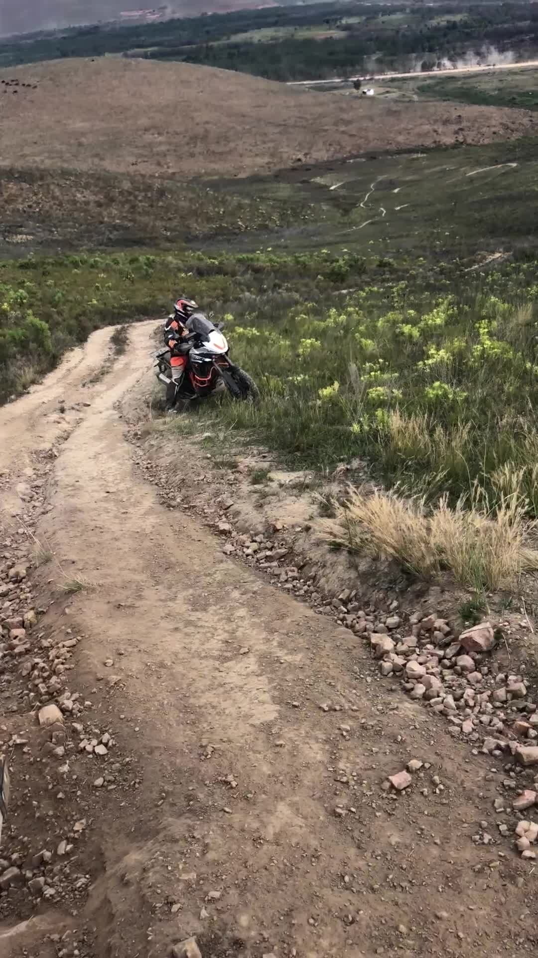 Instructor giving one-on-one feedback to a rider